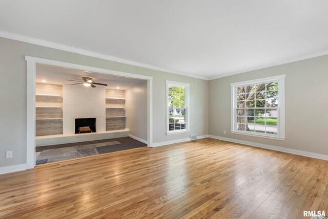 unfurnished dining area with visible vents, wainscoting, and dark wood-style floors