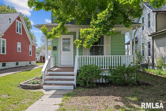 2350 Jefferson Ave, Davenport, IA 52803 - view of front of house featuring covered porch and central air condition unit
