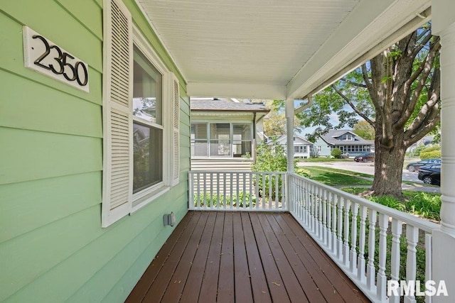 2350 Jefferson Ave, Davenport, IA 52803 - wooden deck with covered porch