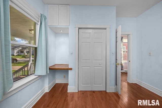 2350 Jefferson Ave, Davenport, IA 52803 - mudroom featuring wood finished floors and baseboards