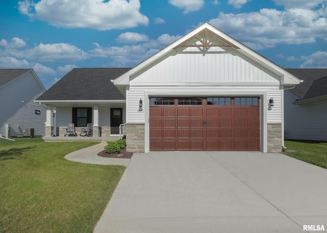 6811 Genesis Way, Bettendorf, IA 52722 - craftsman-style home with stone siding, a porch, a front yard, an attached garage, and central air condition unit