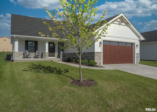 6811 Genesis Way, Bettendorf, IA 52722 - craftsman-style home with stone siding, covered porch, and board and batten siding