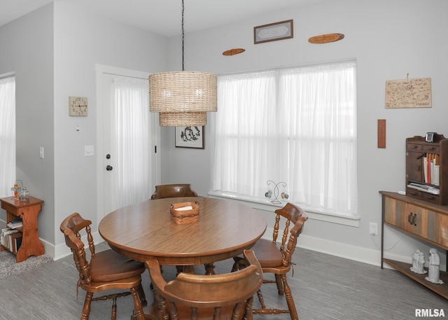 6811 Genesis Way, Bettendorf, IA 52722 - dining space with baseboards and wood finished floors