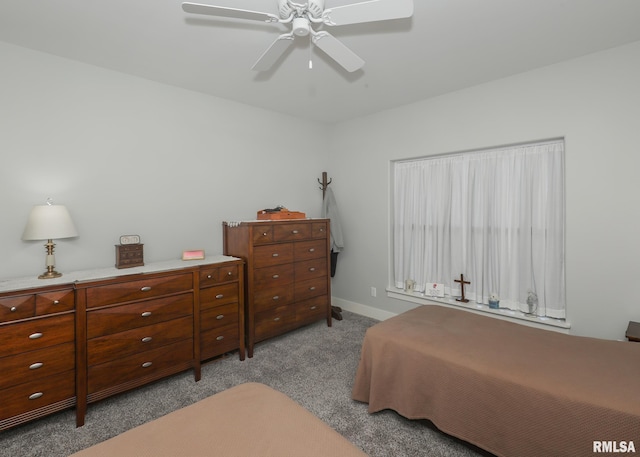 6811 Genesis Way, Bettendorf, IA 52722 - bedroom featuring carpet floors, ceiling fan, and baseboards