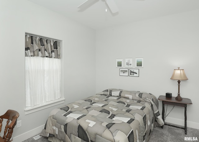 6811 Genesis Way, Bettendorf, IA 52722 - bedroom with baseboards, carpet floors, and ceiling fan