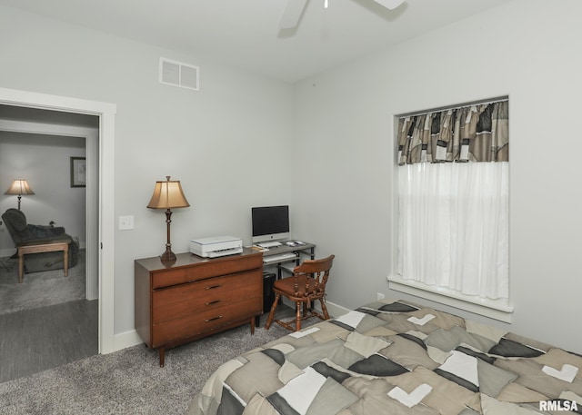 6811 Genesis Way, Bettendorf, IA 52722 - bedroom with baseboards, carpet flooring, a ceiling fan, and wood finished floors