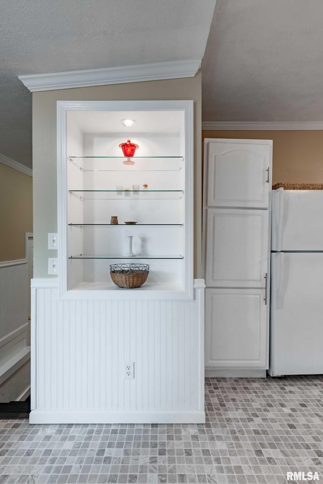 301 N 11th St, Herrin, IL 62948 - kitchen with freestanding refrigerator, ornamental molding, and a wainscoted wall