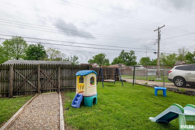 301 N 11th St, Herrin, IL 62948 - view of yard featuring a playground