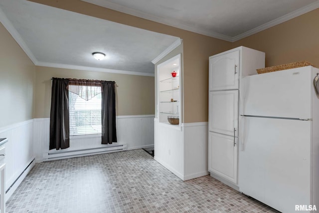 301 N 11th St, Herrin, IL 62948 - kitchen with freestanding refrigerator, wainscoting, a baseboard radiator, baseboard heating, and white cabinets