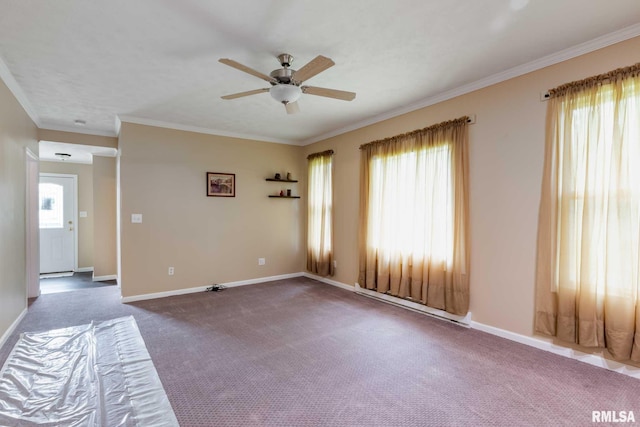 301 N 11th St, Herrin, IL 62948 - empty room with a ceiling fan, carpet flooring, crown molding, baseboards, and a baseboard heating unit