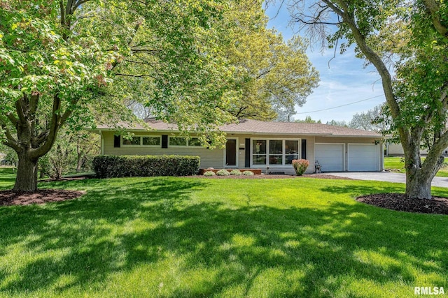 4427 Jersey Ridge Rd, Davenport, IA 52807 - ranch-style home featuring an attached garage, a front lawn, and driveway