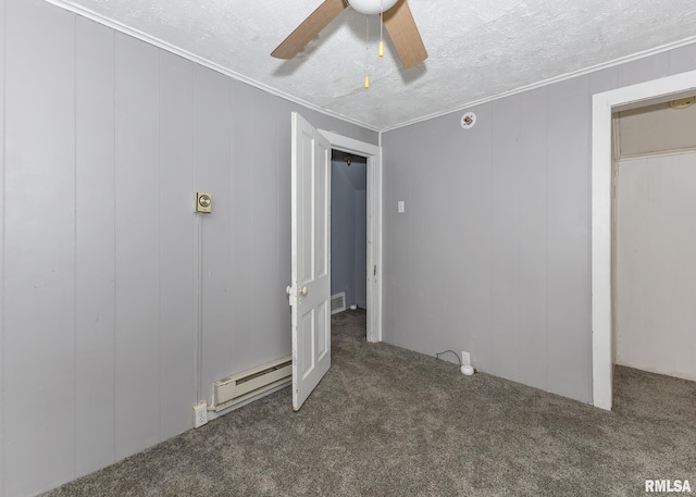 unfurnished bedroom featuring a baseboard radiator, carpet, and a ceiling fan