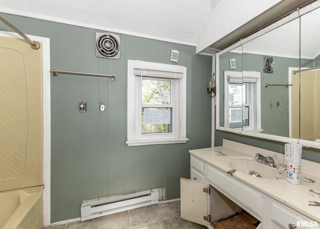 full bath featuring baseboard heating and vanity