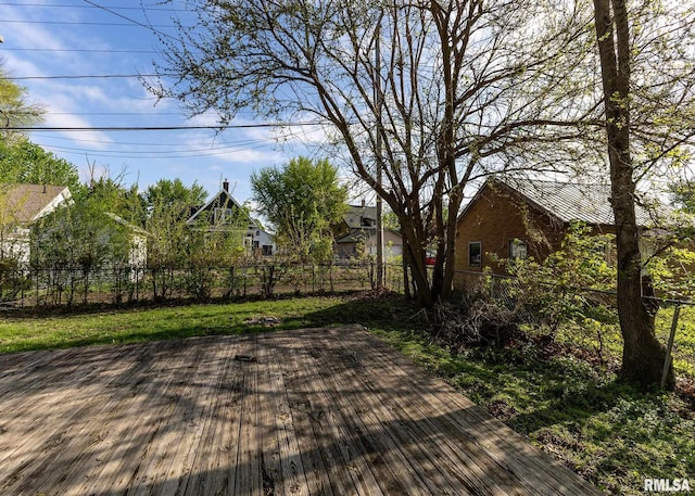 wooden deck featuring fence