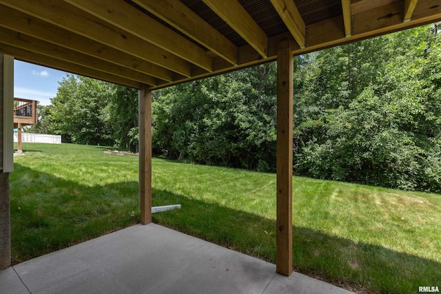 7 Welcome Center Ct, Le Claire, IA 52753 - view of grassy yard with a patio