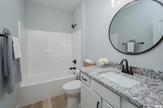7 Welcome Center Ct, Le Claire, IA 52753 - full bath with vanity, wood finished floors, and washtub / shower combination
