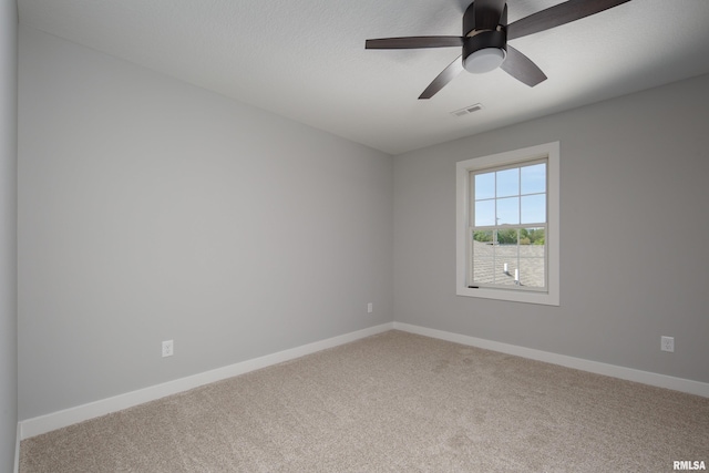 7 Welcome Center Ct, Le Claire, IA 52753 - carpeted empty room with baseboards and ceiling fan