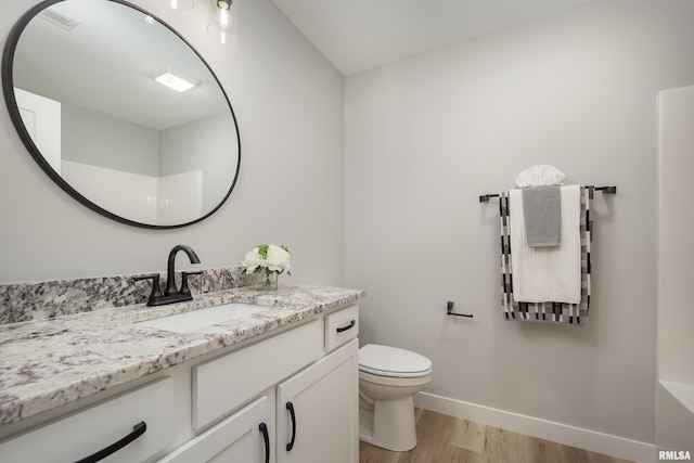7 Welcome Center Ct, Le Claire, IA 52753 - bathroom featuring vanity and wood finished floors