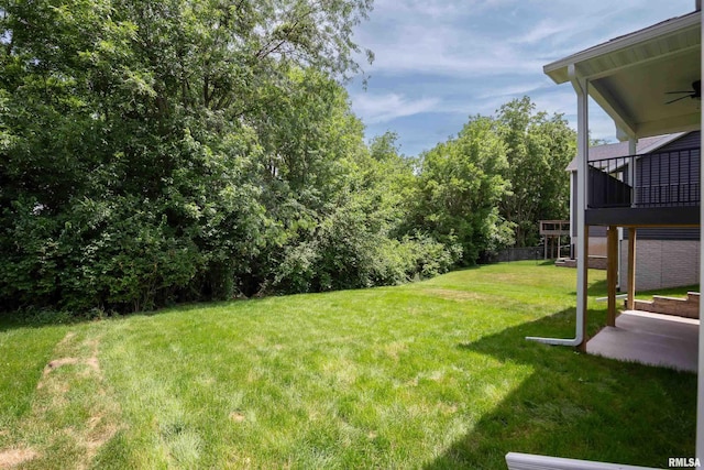 7 Welcome Center Ct, Le Claire, IA 52753 - view of green lawn featuring ceiling fan