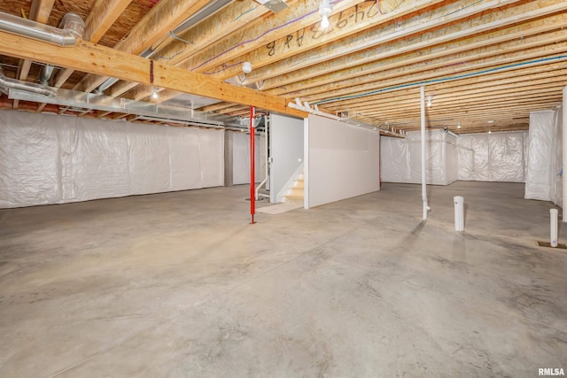 7 Welcome Center Ct, Le Claire, IA 52753 - unfinished basement featuring stairway