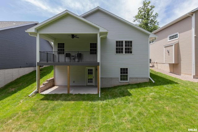 7 Welcome Center Ct, Le Claire, IA 52753 - rear view of property with ceiling fan, a lawn, and a patio area