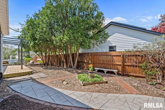 4690 Lindbergh Dr, Bettendorf, IA 52722 - view of yard featuring fence and a patio area