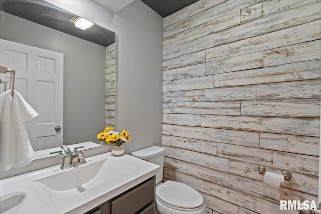 4690 Lindbergh Dr, Bettendorf, IA 52722 - half bathroom with toilet and vanity