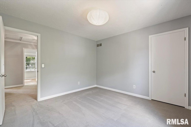 4690 Lindbergh Dr, Bettendorf, IA 52722 - carpeted spare room featuring baseboards