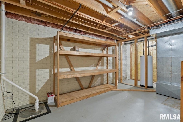 4690 Lindbergh Dr, Bettendorf, IA 52722 - unfinished basement featuring gas water heater and heating unit