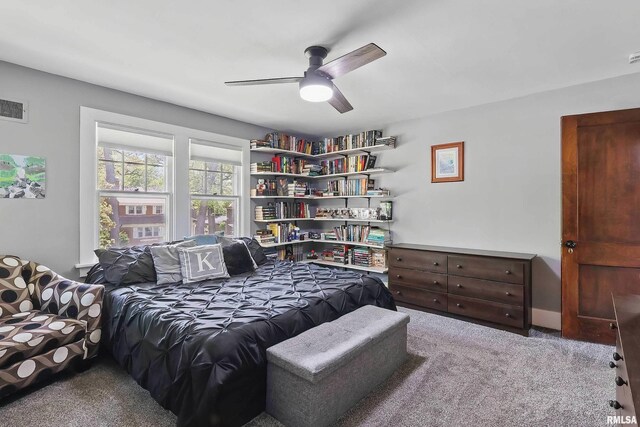 carpeted bedroom with ceiling fan