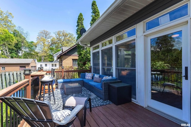 wooden deck featuring an outdoor living space