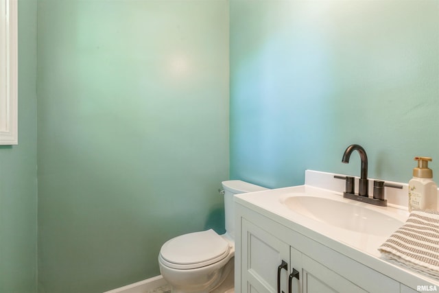1960 Tam-O-Shanter Dr, Bettendorf, IA 52722 - bathroom with toilet and vanity