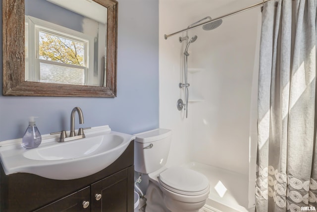 1960 Tam-O-Shanter Dr, Bettendorf, IA 52722 - full bath featuring toilet, curtained shower, and vanity