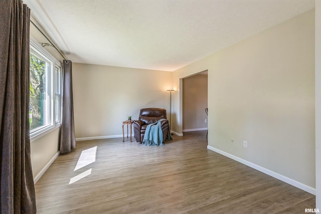 1960 Tam-O-Shanter Dr, Bettendorf, IA 52722 - unfurnished room with light wood-type flooring and baseboards