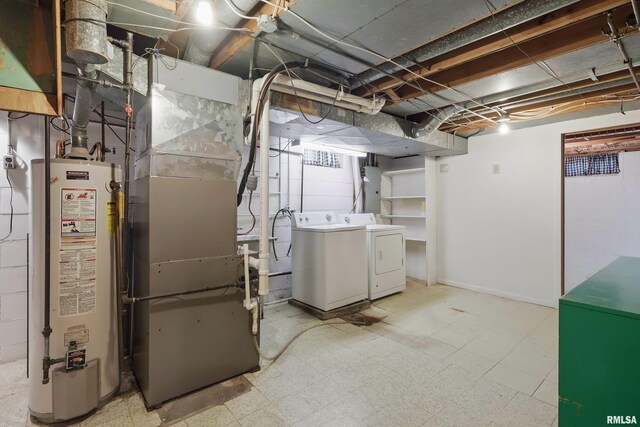 unfinished basement featuring water heater, washer and clothes dryer, tile patterned floors, and heating unit