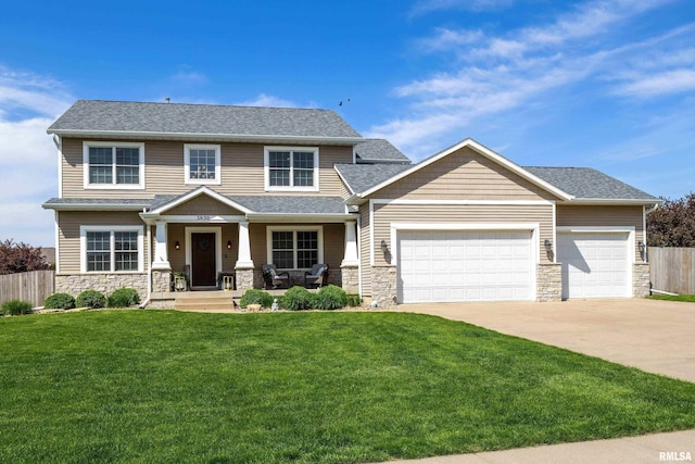 view of front of property with stone siding, a garage, driveway, a porch, and a shingled roof