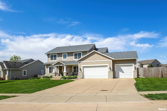 craftsman-style home featuring stone siding, a garage, a porch, and driveway
