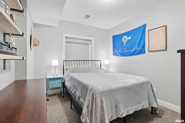 bedroom featuring baseboards