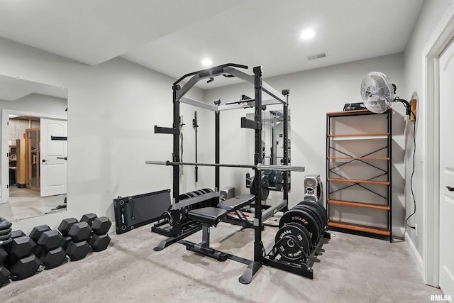 exercise area featuring recessed lighting