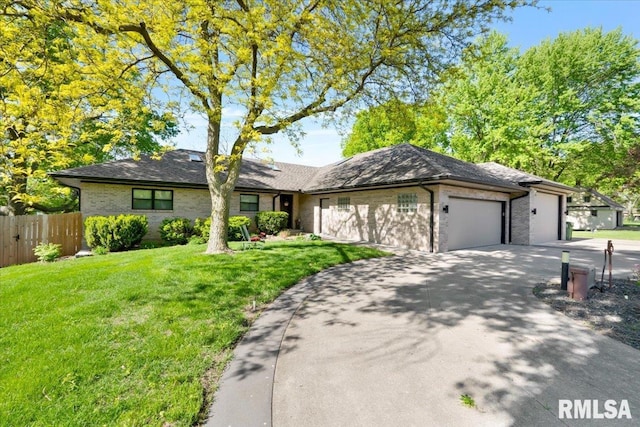 view of front facade featuring an attached garage, driveway, and brick siding