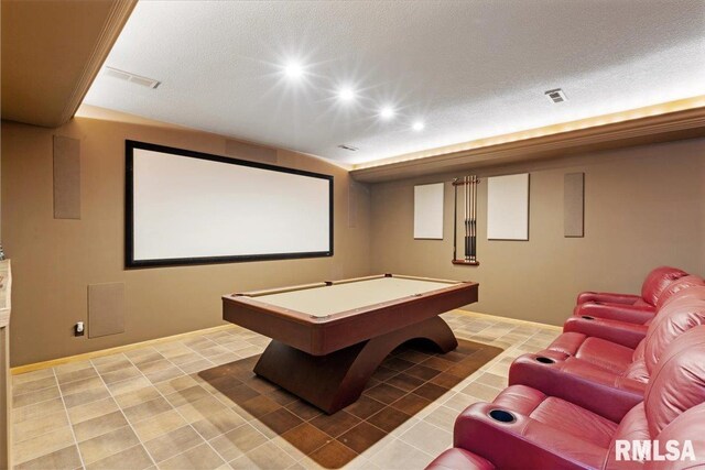 home theater featuring billiards table, light tile patterned floors, recessed lighting, and a textured ceiling