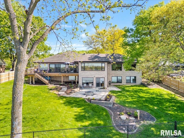 back of property featuring stairs, a patio area, and a wooden deck