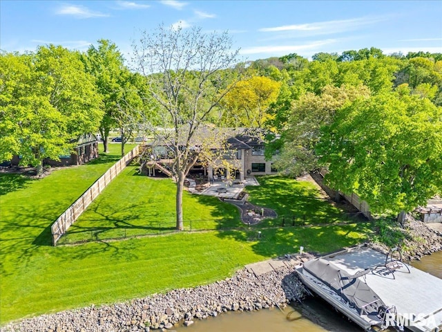 aerial view of property and surrounding area featuring a large body of water