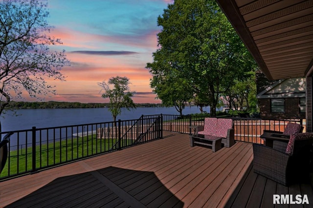 deck at dusk with a water view