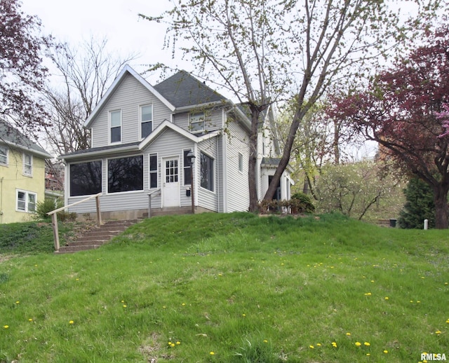 traditional home with a front lawn