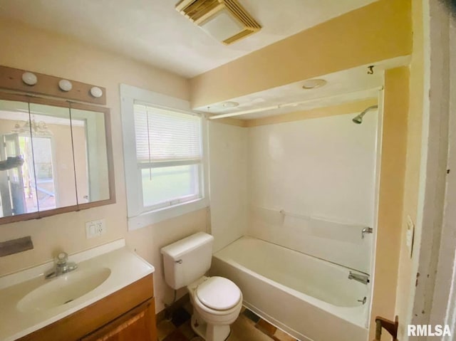 1202 17th Ave, Viola, IL 61486 - bathroom with toilet, vanity, and shower / bath combination