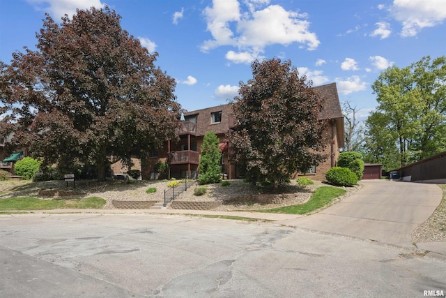 2505 26th Avenue Ct Unit J, Rock Island, IL 61201 - view of front of home with mansard roof and a shingled roof