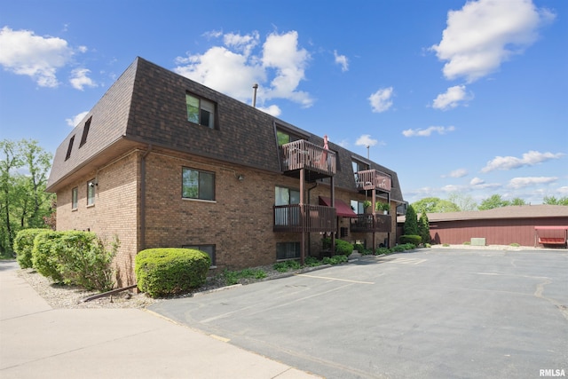 2505 26th Avenue Ct Unit J, Rock Island, IL 61201 - view of building exterior with uncovered parking