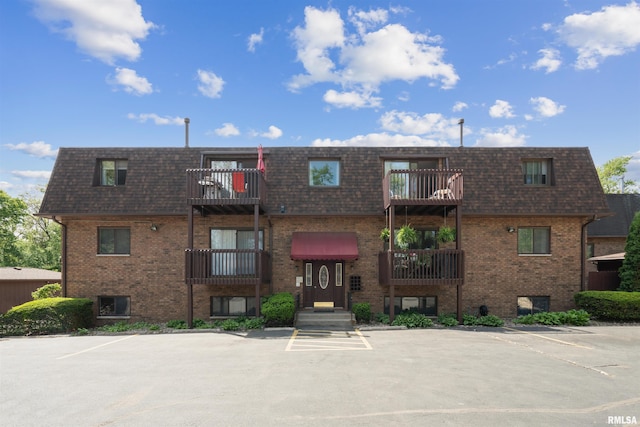 2505 26th Avenue Ct Unit J, Rock Island, IL 61201 - view of building exterior featuring uncovered parking