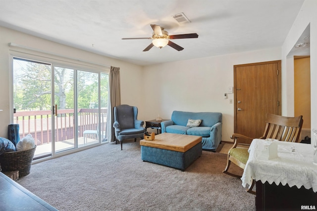 2505 26th Avenue Ct Unit J, Rock Island, IL 61201 - living area with carpet and ceiling fan